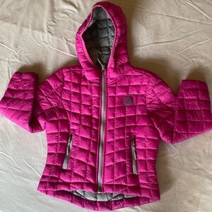 Size 5/6 Reebok winter jacket. Pink with two zip pockets and hood.